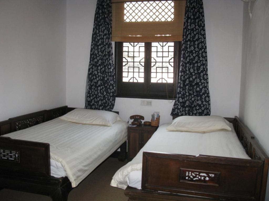XI Di Travel Lodge Yi (Anhui) Pokój zdjęcie
